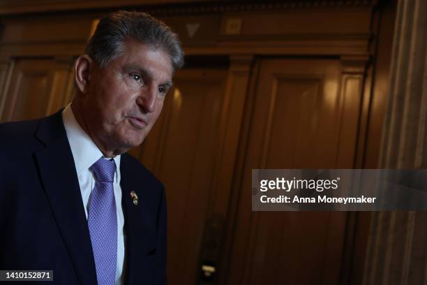 Sen. Joe Manchin walks out of the Senate Chambers in the U.S. Capitol on July 21, 2022 in Washington, DC. The Senate wrapped up their votes for the...