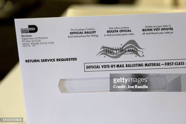 Vote-by-mail ballot envelope is shown to the media at the Miami-Dade Election Department headquarters on July 21, 2022 in Miami, Florida. The...