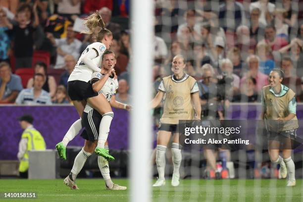 Alexandra Popp of Germany celebrates with teammates after scoring their side's second goal during the UEFA Women's Euro 2022 Quarter Final match...