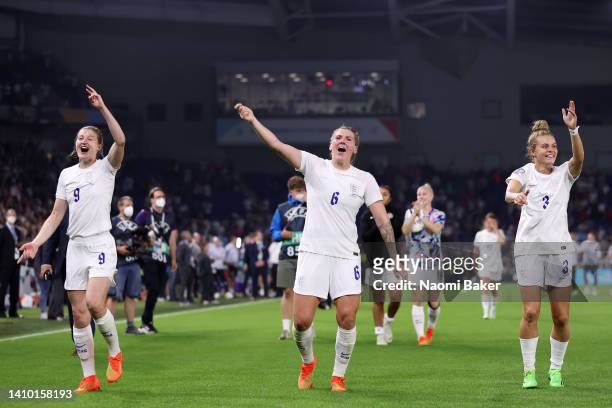 Ellen White, Millie Bright and Rachel Daly of England celebrate their sides victory during the UEFA Women's Euro England 2022 Quarter Final match...
