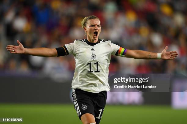 Alexandra Popp of Germany celebrates after scoring their side's second goal during the UEFA Women's Euro 2022 Quarter Final match between Germany and...