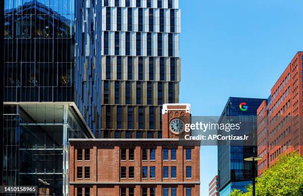 kendall square buildiings along main street - cambridge massachusetts - cambridge street stock pictures, royalty-free photos & images