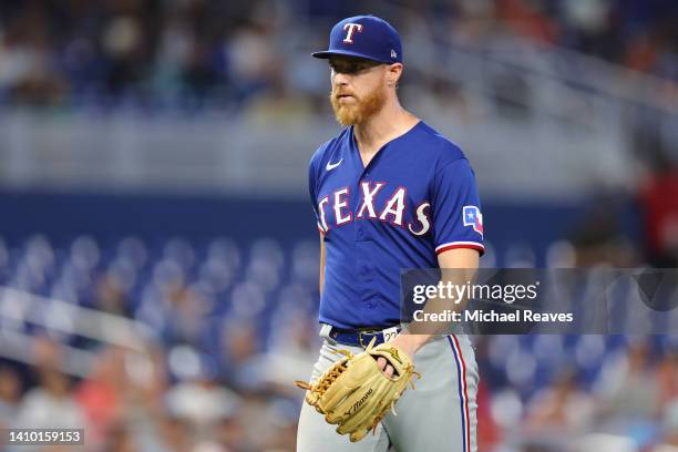 Jon Gray of the Texas Rangers reacts against the Miami Marlins at loanDepot park on July 21, 2022 in Miami, Florida.