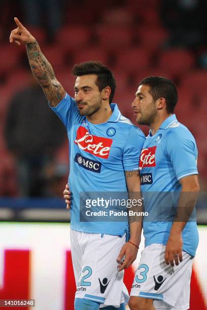 Ezequiel Lavezzi with celebrates with his team-mate Walter Gargano of SSC Napoli after scoring the fourth goal from the penalty during the Serie A...