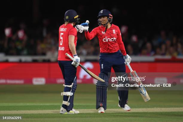 Sophia Dunkley of England is and Heather Knight pump gloves in the middle during the 1st Vitality IT20 match between England Women and South Africa...