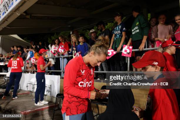 Danni Wyatt of England signs autographs for fans during the 1st Vitality IT20 match between England Women and South Africa Women at the Cloudfm...