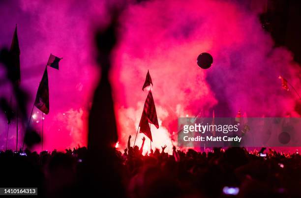 The crowd watch as Coldplay perform on the main Pyramid Stage at the 2016 Glastonbury Festival held at Worthy Farm, in Pilton, Somerset on June 26,...
