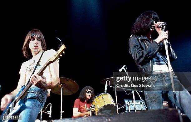 Johnny Ramone , Tommy Ramone and Joey Ramone of The Ramones perform on stage at The Roundhouse, Camden, London, 4th July 1976.
