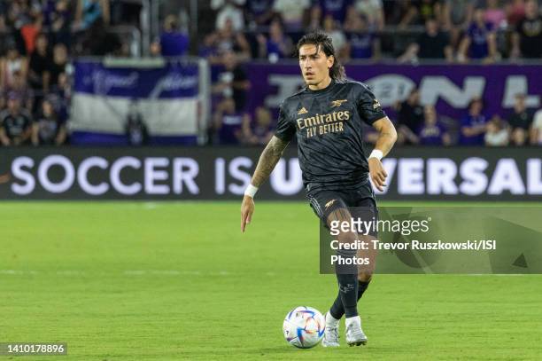 Hector Bellerin of Arsenal dribbles the ball during a game between Arsenal FC and Orlando City at Exploria Stadium on July 20, 2022 in Orlando,...