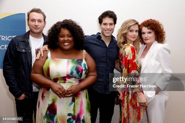 Brandon Scott Jones, Danielle Pinnock, Asher Grodman, Rose McIver, and Rebecca Wisocky attend the "Ghosts" photo call during 2022 Comic Con...