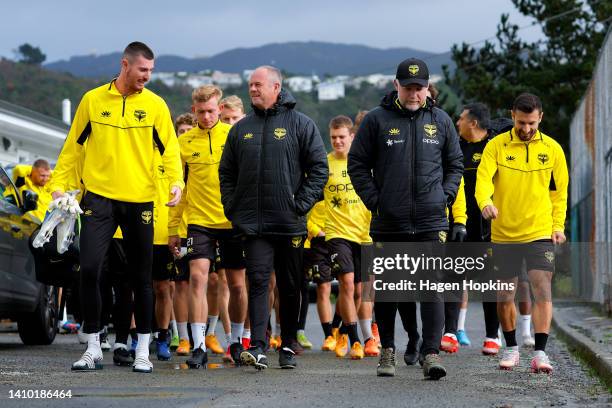 To R, Oliver Sail, Goalkeeping Coach Jonathan Gould and Coach Ufuk Talay take the field during a Wellington Phoenix A-League media opportunity at...