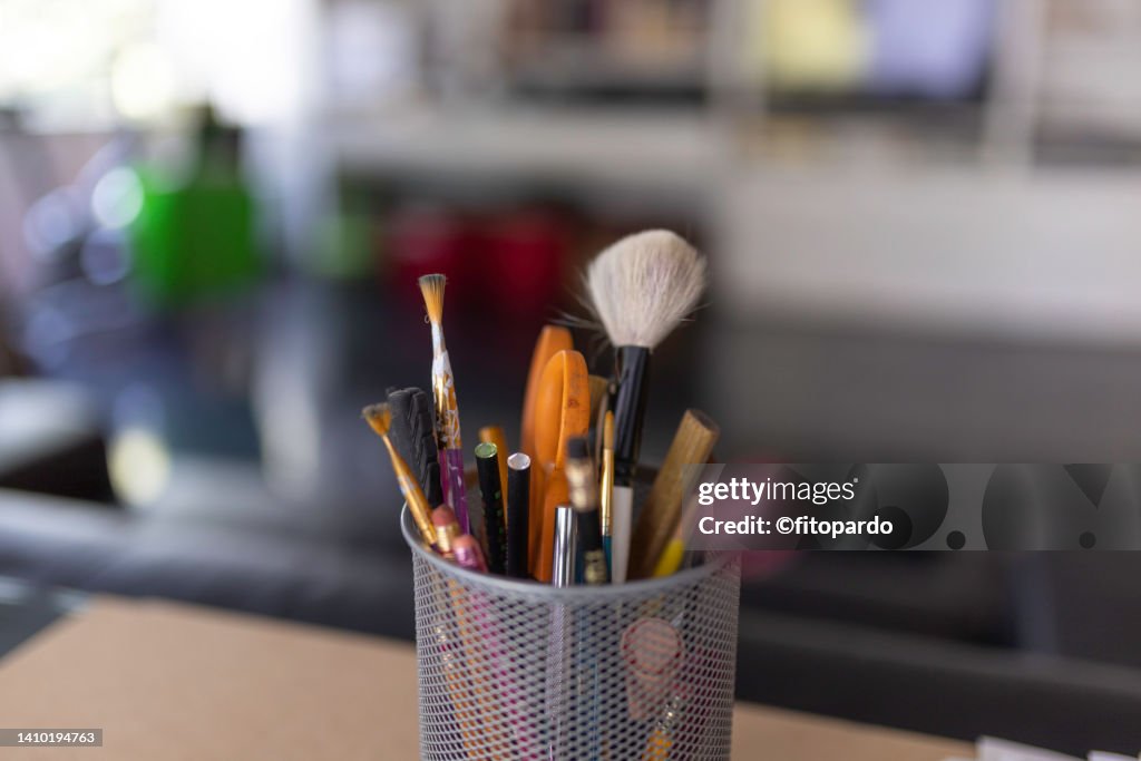 Brushes and pencils at the studio