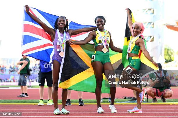 Bronze medalist Dina Asher-Smith of Team Great Britain, gold medalist Shericka Jackson of Team Jamaica, and silver medalist Shelly-Ann Fraser-Pryce...