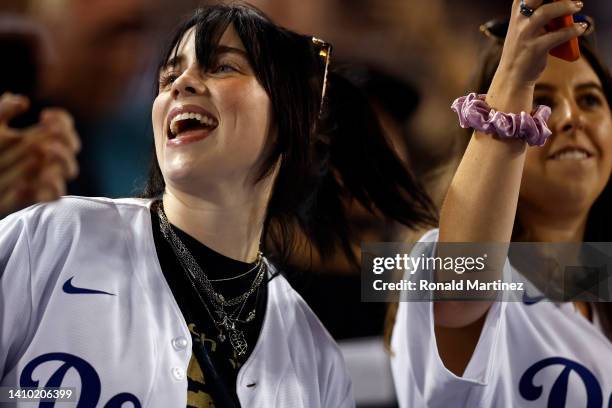 Billie Eilish attends a game between the San Francisco Giants and the Los Angeles Dodgers in the fifth inning at Dodger Stadium on July 21, 2022 in...