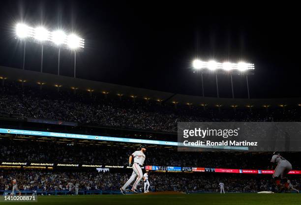 Darin Ruf of the San Francisco Giants runs after hitting a grand slam against the Los Angeles Dodgers in the seventh inning at Dodger Stadium on July...