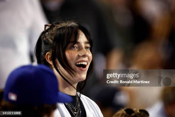 Billie Eilish attends a game between the San Francisco Giants and the Los Angeles Dodgers in the fifth inning at Dodger Stadium on July 21, 2022 in...