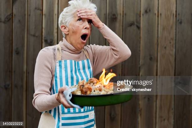 oh no, my dinner is burnt! - ruined dinner stock pictures, royalty-free photos & images