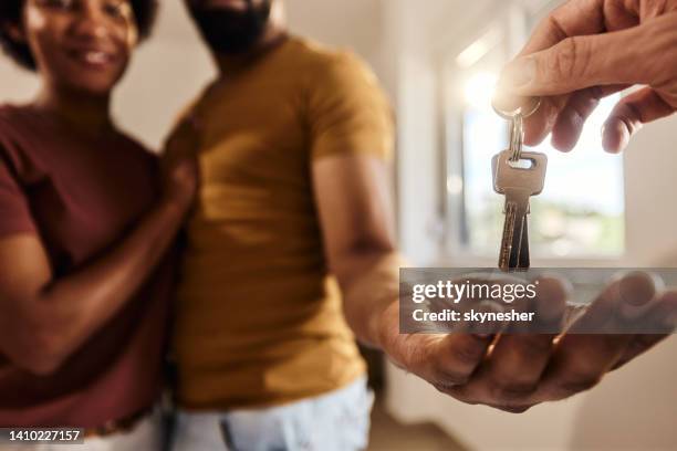 these are the keys of your new home! - handing over keys bildbanksfoton och bilder