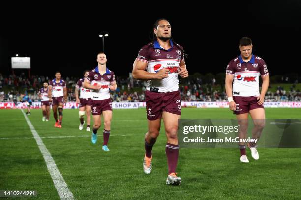 Martin Taupau of the Sea Eagles and team mates leave the field at half-time during the round 19 NRL match between the St George Illawarra Dragons and...