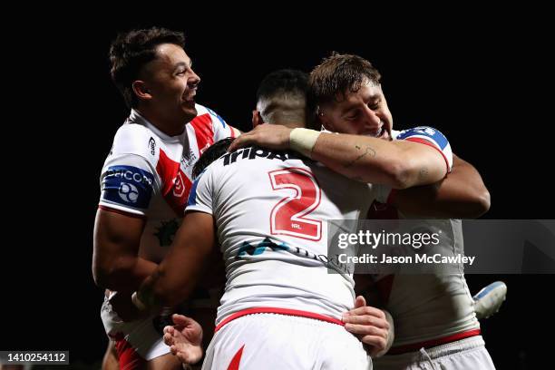 Mathew Feagai of the Dragons celebrates scoring a try with team mates during the round 19 NRL match between the St George Illawarra Dragons and the...