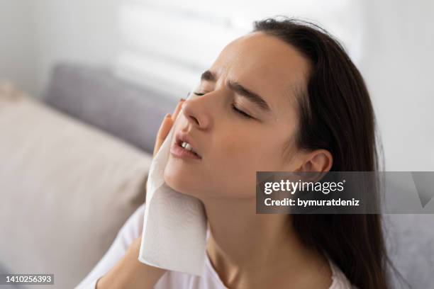 woman sweating suffering heat stroke at home - hyperthermia stock pictures, royalty-free photos & images