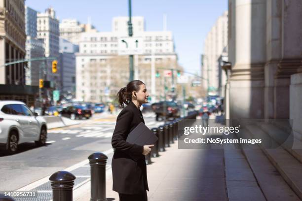 female lawyer rushing to the court - businesswoman nyc stock pictures, royalty-free photos & images