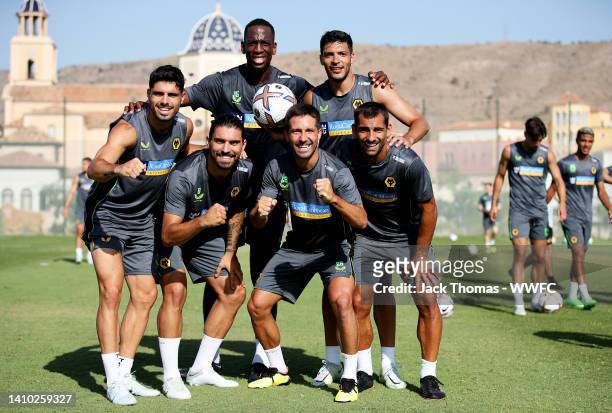 Pedro Neto, Willy Boly, Raul Jimenez, Ruben Neves, Joao Moutinho and Jonny Otto of Wolverhampton Wanderers pose for a team photo during a...