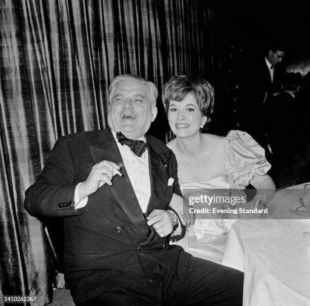 British Conservative politician Robert Boothby, Baron Boothby , and English film and television actress Barbara Shelley , attend an event, UK, 16th...