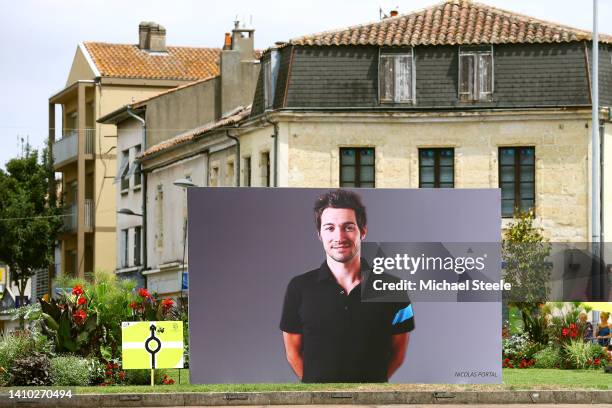 Banner shows an image to pay tribute to Nicolas Portal, ex-pro cyclist and sports director of the Sky team in his hometown of Auch during the 109th...