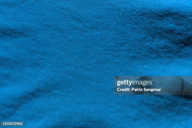 blue color fabric cloth polyester texture and textile background. - jersey fabric stockfoto's en -beelden