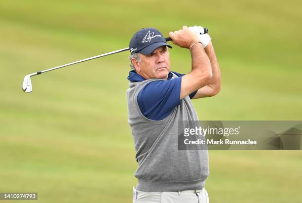 David Frost of Republic of South Africa plays his second shot at the 12th hole during Day Two of The Senior Open Presented by Rolex at The King's...
