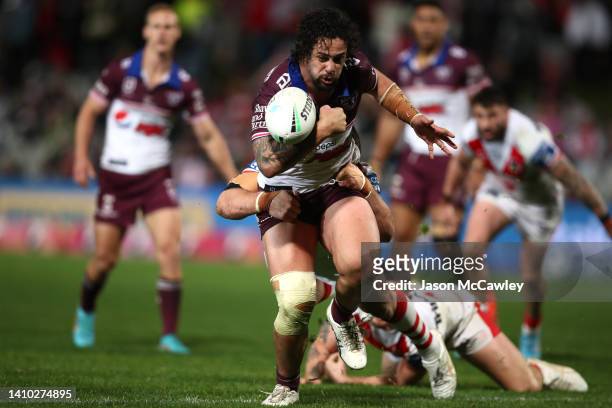 Josh Aloiai of the Sea Eagles drops the ball during the round 19 NRL match between the St George Illawarra Dragons and the Manly Sea Eagles at...