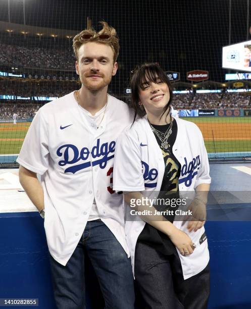 Finneas and Billie Eilish attend the Los Angeles Dodgers Game at Dodger Stadium on July 21, 2022 in Los Angeles, California.