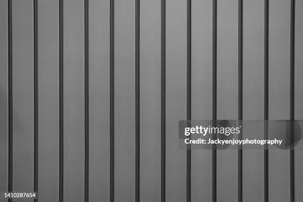 view of dark wooden panel background. - wood paneling stock pictures, royalty-free photos & images