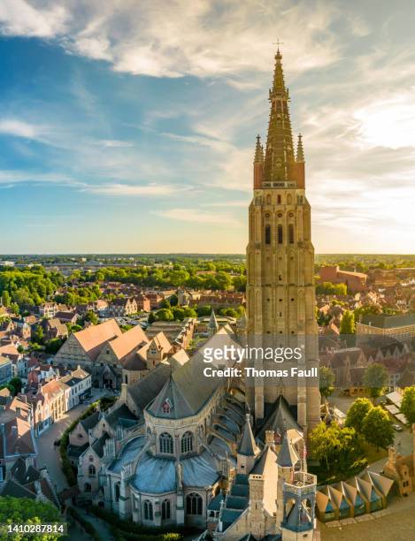 aerial view of church of our lady in bruges - bruges stock pictures, royalty-free photos & images