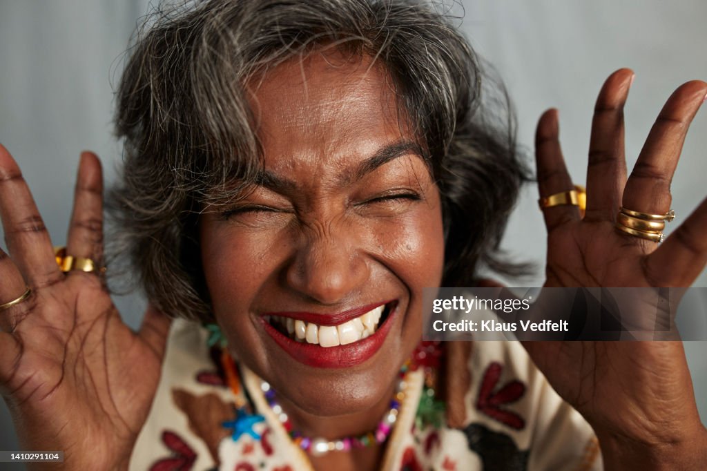 Happy woman with eyes closed