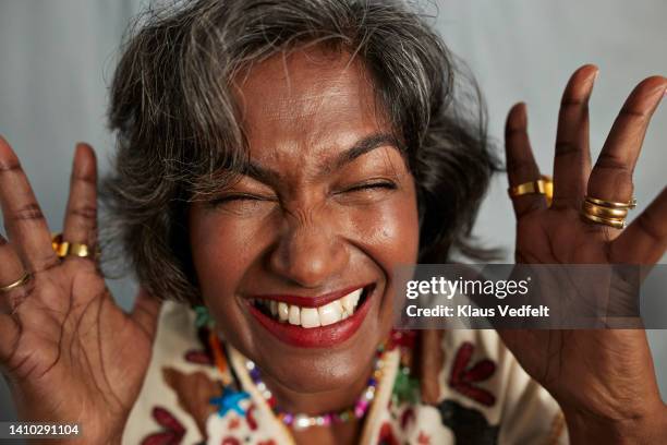 happy woman with eyes closed - mature women portrait asian bildbanksfoton och bilder