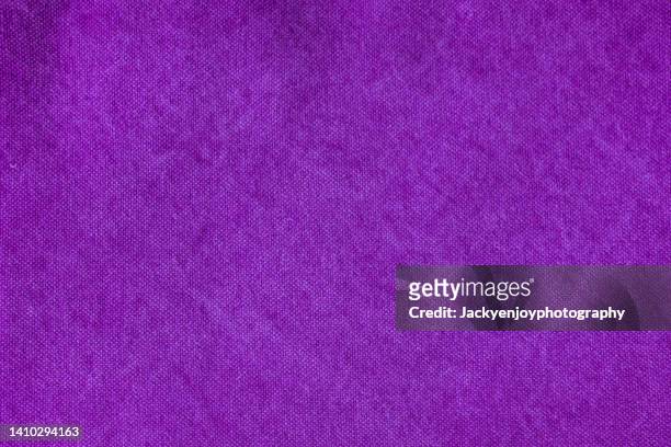 purple natural linen cloth fabric textile background - fieltro fotografías e imágenes de stock