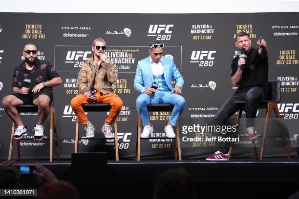 Michael Bisping hosts the UFC 280 Press Conference with Charles Oliveira of Brazil, Sean O'Malley, and Belal Muhammad at O2 Arena on July 22, 2022 in...