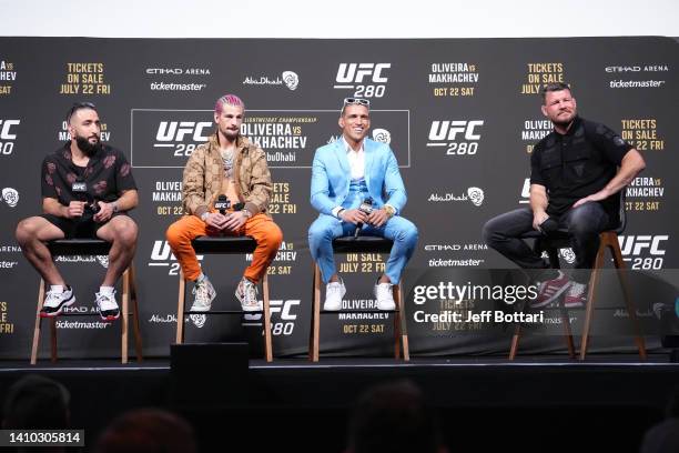 Michael Bisping, Charles Oliveira of Brazil, Sean O'Malley and Belal Muhammad are seen on stage during the UFC 280 Press Conference at O2 Arena on...