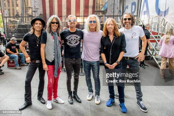 Band members Luis Maldonado, Kelly Hansen, Chris Frazier, Bruce Watson, Jeff Pilson and Paul Mirkovichon backstage as the band Foreigner performs on...