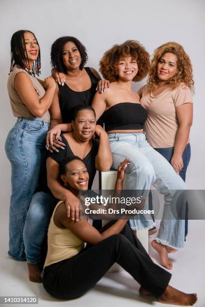 beautiful latin american black women on a white background - global fashion collective stock pictures, royalty-free photos & images