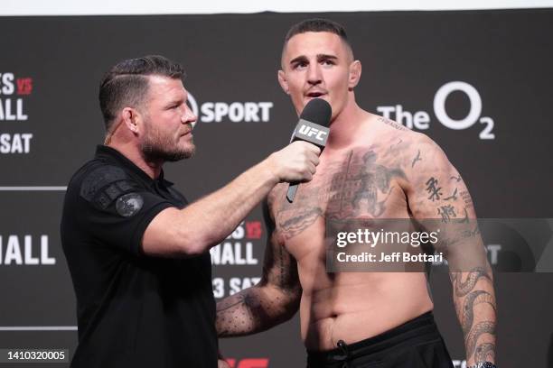 Michael Bisping interviews Tom Aspinall of England during the UFC Fight Night ceremonial weigh-in at O2 Arena on July 22, 2022 in London, England.