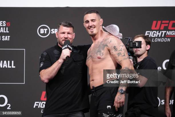 Michael Bisping interviews Tom Aspinall of England during the UFC Fight Night ceremonial weigh-in at O2 Arena on July 22, 2022 in London, England.