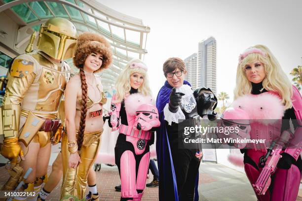 Cosplayers dressed as Austin Powers attend 2022 Comic-Con International: San Diego on July 21, 2022 in San Diego, California.