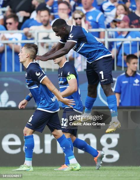 Marvin Mehlem of Darmstadt celebrates their team's second goal with teammate Braydon Manu during the Second Bundesliga match between SV Darmstadt 98...