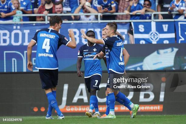 Marvin Mehlem of Darmstadt celebrates their team's second goal with teammates during the Second Bundesliga match between SV Darmstadt 98 and SV...