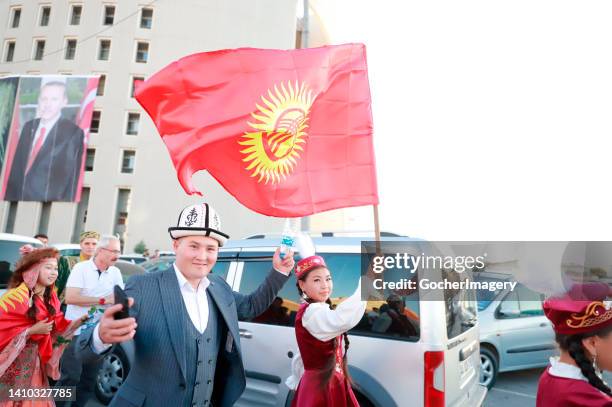 Performers from Kyrgyzstan take part in a march as part of the 25th International Apricot Festival in Malatya, Turkey, on Thursday, July 21, 2022.