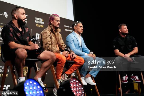 Belal Muhammad, Sean O'Malley, Charles Oliveira of Brazil and Michael Bisping are seen on stage during the UFC 280 Press Conference at O2 Arena on...