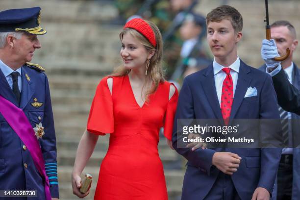 King Philippe of Belgium, Princess Elisabeth of Belgium and Prince Emmanuel of Belgium leave the Te Deum during the National Day on July 21, 2022 in...